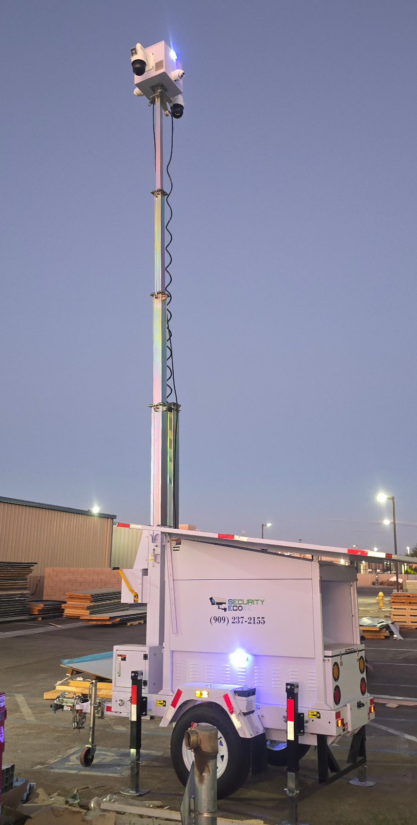 Security Eco trailer with telescoping mast extended during dawn lighting